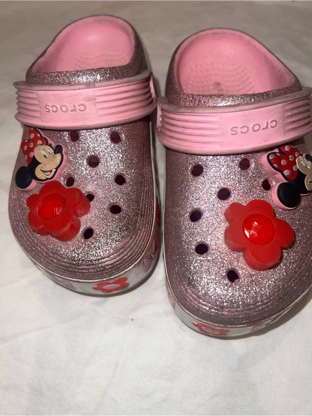 CROCS Kids' Pink Glitter Clogs with Red Flower & Minnie Charms